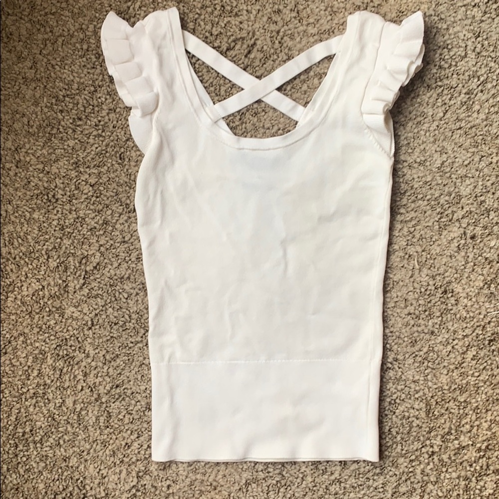 White ruffled shoulder knit top